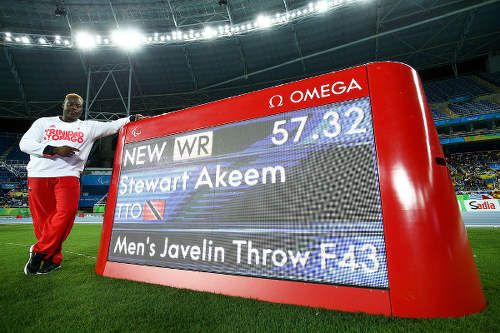 Photo: Trinidad and Tobago's Akeem Stewart shows off his world record performance at the Rio 2016 Paralympic Games on 9 September 2016. (Copyright Hagen Hopkins/Getty Images)