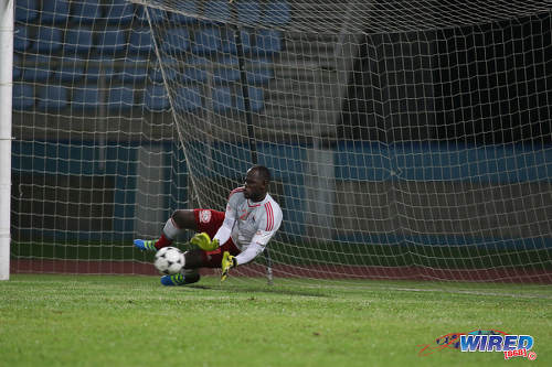 Photo: Central FC goalkeeper Jan-Michael Williams saves a penalty during the Digicel Charity Shield on 10 September 2016. Central won 3-1 from kicks from the penalty mark after a 2-2 regulation time draw. (Courtesy Chevaughn Christopher/Wired868)