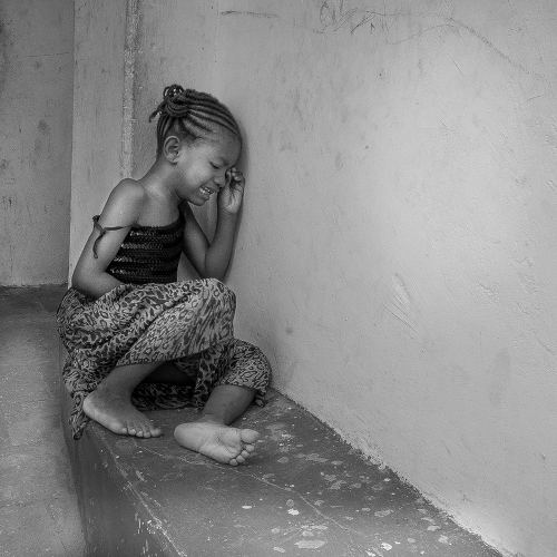 Photo: A molested girl. (Copyright Jamaica Empire)