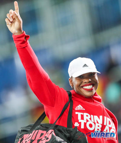 Photo: Trinidad and Tobago shot put champion Cleopatra Borel smells the roses during the Rio 2106 Olympic Games. (Courtesy Allan V Crane/Wired868)