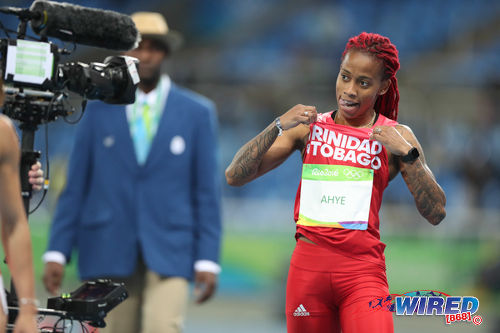 Photo: Trinidad and Tobago sprinter Michelle Lee-Ahye (right) reps her country at the Rio 2016 Olympic Games. (Courtesy Allan V Crane/Wired868)