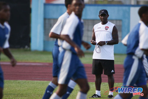 Photo: Trinidad and Tobago National Under-17 Team coach Russell Latapy (background) looks on at a national training schedule. (Courtesy Chevaughn Christopher/Wired868)