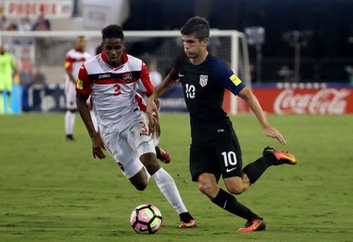 Photo: United States midfielder Christian Pulisic (right) tries to get past Trinidad and Tobago winger Joevin Jones during FIFA 2018 World Cup qualifying action at the EverBank Field on 6 September 2016 in Jacksonville, Florida. The United States won 4-0. (Copyright Sam Greenwood/Getty Images/AFP)