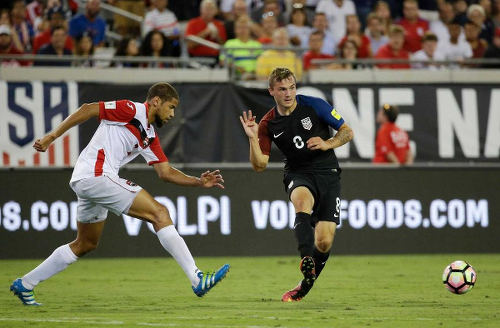 Photo: United States substitute Jordan Morris (right) passes the ball while Trinidad and Tobago defender Radanfah Abu looks on during FIFA 2018 World Cup qualifying action at the EverBank Field on 6 September 2016 in Jacksonville, Florida. (Courtesy CONCACAF)