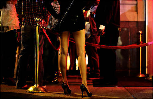 Photo: Patrons line up outside a swanky nightclub. (Copyright NightClubs In NYC)