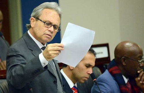 Photo: Finance Minister Colm Imbert responds to questions in Parliament.. (Copyright WEFM)