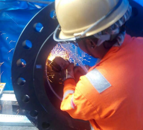 Photo: Former Trinidad and Tobago National Under-20 Team winger Aaron Downing does a welding job in this undated photograph.