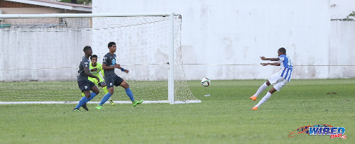 Photo: Boom! St Mary's College attacker Tyrese Spicer (right) fires the ball into the top corner during SSFL Premier Division action against Naparima College at Serpentine Road on 8 October 2016. (Courtesy Sean Morrison/Wired868)