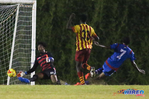 Photo: Point Fortin Civic goalkeeper Miles Goodman (left) saves a low effort from St Ann's Rangers midfielder Sedale McClean during Pro League action on 30 October 2016 at Mahaica Oval. (Courtesy Chevaughn Christopher/Wired868)