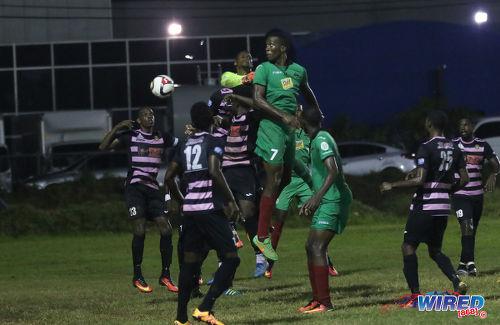 Photo: San Juan Jabloteh forward Jamal Gay (centre) diverts a corner kick past Ma Pau Stars goalkeeper Glenroy Samuel during Pro League action at the Barataria Recreation on 23 October 2016. Jabloteh won 1-0. (Courtesy Sean Morrison/Wired868)