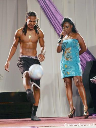 Photo: Matthew Bartholomew (left) shows off his skills to MC and comedienne Rachel Price during the talent category of the Mr Point Fortin competition in the 2009 Point Fortin Borough Day celebrations. (Copyright Newsday)