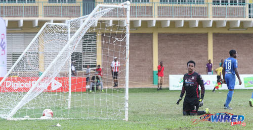 Photo: Naparima College goalkeeper Levi Fernandez looks back in despair after another St Anthony's College goal during SSFL Premier Division action at Westmoorings on 15 October 2016. (Courtesy Sean Morrison/Wired868)