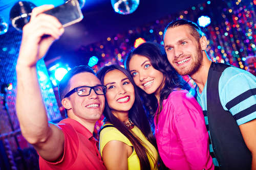 Photo: Partygoers capture the moment with a selfie. (Copyright Radioactiva)