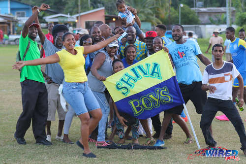 Photo: Shiva Boys Hindu College coach Hayden Ryan (centre) poses with school supporters after their 3-0 SSFL Premier Division win over St Mary's College at Lachoo Road on 19 October 2016. (Courtesy Sean Morrison/Wired868)