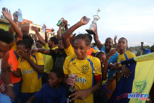 Photo: Shiva Boys Hindu College stand-in captain Tyrel "Pappy" Emmanuel (front, centre) and his squad celebrates after clinching the 2016 SSFL Premier Division crown after defeating Pleasantville Secondary 3-1 on 22 October 2016. (Courtesy Chevaughn Christopher/Wired868)