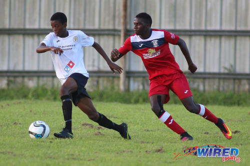 Photo: St Anthony's College and Trinidad and Tobago National Under-17 Team winger Tyrese Bailey (left) in action against Fyzabad Secondary on 24 September 2016. (Courtesy Chevaughn Christopher/Wired868)