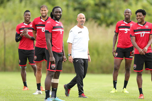 Photo: Trinidad and Tobago National Senior Team coach Stephen Hart (centre) and players (from right) Mekeil Williams, Daneil Cyrus, Kenwyne Jones, Radanfah Abu Bakr and Sheldon Bateau at a national training session. (Courtesy Allan V Crane/CA Images)