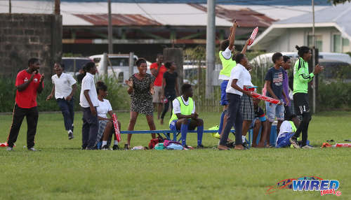 Photo: Diego Martin North Secondary substitutes and supporters react to an early goal by their school during North Zone Intercol action against Blanchisseuse Secondary at the St Mary's College ground in St Clair on 2 November 2016. (Courtesy Sean Morrison/Wired868)