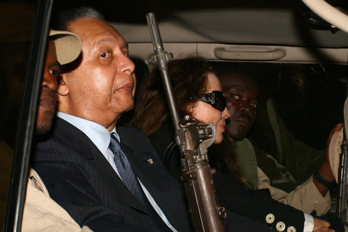 Photo: Former Haiti president Jean-Claude "Papa Doc" Duvalier (second from left). (Copyright Tico Times)