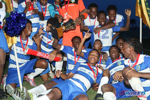 Photo: Presentation College (San Fernando) schoolboys celebrate with the 2016 South Zone Intercol trophy after defeating Shiva Boys Hindu College 2-1 in kicks from the penalty mark at the Mannie Ramjohn Stadium on 18 November 2016. (Courtesy Chevaughn Christopher/Wired868)