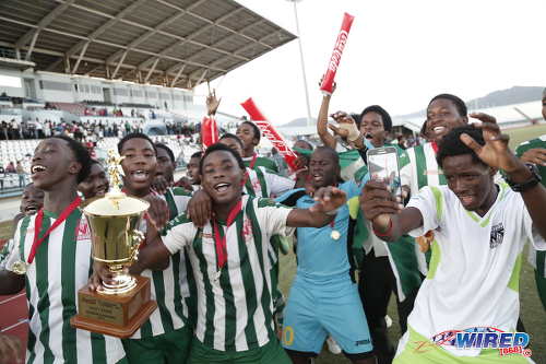 Photo: The San Juan North Secondary football team dances away with the East Zone Intercol trophy after edging St Augustine Secondary 2-1 in the final at the Larry Gomes Stadium, Malabar on 21 November 2016. (Courtesy Annalicia Caruth/Wired868)