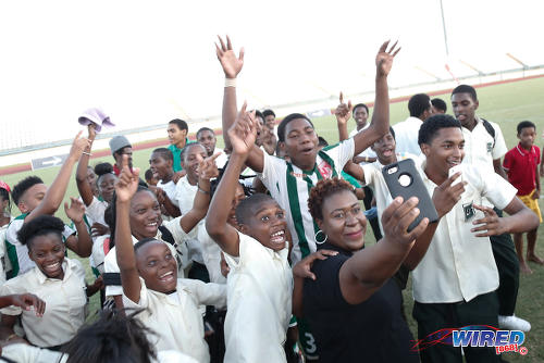 Photo: San Juan North Secondary fans try to capture the moment as they celebrate their East Zone Intercol final triumph over St Augustine Secondary at the Larry Gomes Stadium, Malabar on 21 November 2016. (Courtesy Annalicia Caruth/Wired868)