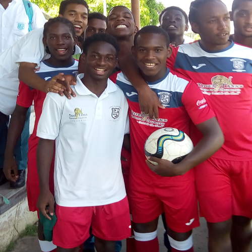 Photo: Fyzabad Secondary captain Sharkeel Louison (front row, right) and his school teammates. (Courtesy Carlotta Rivas/Wired868)