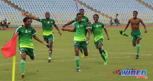 Photo: Trinity College Moka players celebrate after eliminating St Mary's College on kicks from the penalty mark in the North Zone Intercol semifinal at the Hasely Crawford Stadium on 16 November 2016. (Copyright Sean Morrison/Wired868)