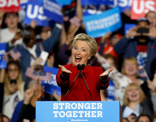 Photo: Democratic presidential nominee Hillary Clinton speaks during a rally at the Grand Valley State University Fieldhouse on 7 November 2016 in Allendale, Michigan. (Copyright AFP 2016/Jeff Kowalsky)