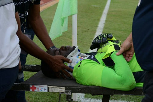 Photo: Trinidad and Tobago goalkeeper Jan-Michael Williams is taken out of the field on a stretcher during their 2018 FIFA World Cup qualifier in San Pedro Sula, Honduras on 15 November 2016. (Copyright AFP 2016/Orlando Sierra)