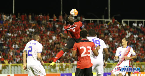 Photo: Trinidad and Tobago captain Kenwyne Jones (top) climbs to head the ball during Russia 2018 World Cup qualifying action against Costa Rica at the Hasely Crawford Stadium on 11 November 2016. (Courtesy Sean Morrison/Wired868)