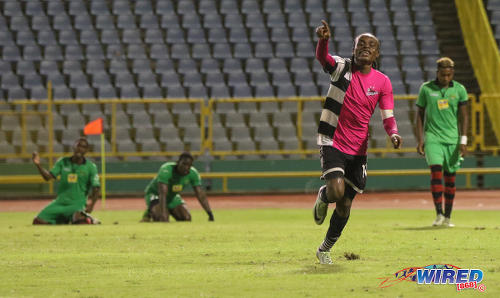 Photo: Central FC midfielder and captain Darren Mitchell (foreground) celebrates his game winning strike against San Juan Jabloteh in Pro League action at the Hasely Crawford Stadium on 2 December 2016. (Courtesy Sean Morrison/Wired868)