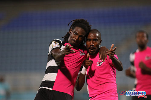 Photo: Central FC goal scorers Jason Marcano (left) and Johan Peltier celebrate during their 2-0 win over Morvant Caledonia United in Pro League action at the Ato Boldon Stadium in Couva on 20 December 2016. (Courtesy Chevaughn Christopher/Wired868)