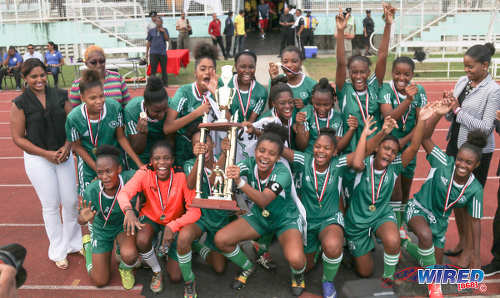 Photo: The St Augustine Secondary girls team celebrate with the 2016 National Intercol trophy after defeating Fyzabad Secondary at the Mannie Ramjohn Stadium in Marabella on 6 December 2016. (Courtesy Sean Morrison/Wired868)