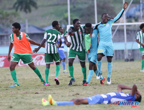 Photo: San Juan Secondary striker Renaldo Boyce (centre) and his teammates celebrate after their 1-0 win over Presentation College (San Fernando) in the National Intercol final at the Mannie Ramjohn Stadium in Marabella on 6 December 2016. (Courtesy Sean Morrison/Wired868)