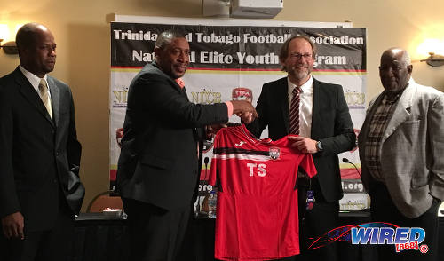 Photo: Trinidad and Tobago Football Association (TTFA) president David John-Williams (second from left) welcomes new National Senior Team coach Tim Saintfiet (second from right) during a press conference at the Marriott Hotel on 7 December 2016. Looking on is new general secretary Justin Latapy-George (far left) and technical director Muhammad Isa. (Courtesy Wired868)