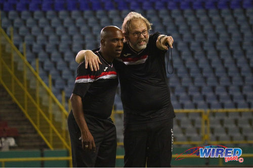 Photo: Trinidad and Tobago National Senior Team coach Tom Saintfiet (right) makes a point to paramedic Dave Isaacs during training at the Hasely Crawford Stadium in Port of Spain on 15 December 2016. (Courtesy Nicholas Williams/Wired868)