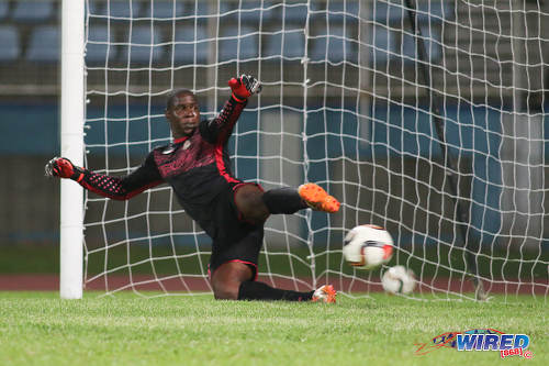 Photo: Defence Force goalkeeper Sheldon Clarke watches in despair as Central FC forward Jason Marcano's penalty flies past him during Pro League action at the Ato Boldon Stadium, Couva on 24 January 2017. (Courtesy Chevaughn Christopher/Wired868)