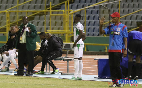 Photo: W Connection coach Stuart Charles-Fevrier (left) gives instructions to substitute Jesus Perez (centre) while St Ann's Rangers coach Anthony Streete looks on during Pro League action at the Hasely Crawford Stadium on 17 January 2017. (Courtesy Sean Morrison/Wired868)