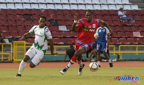 Photo: W Connection attacker Neil Benjamin Jr (left) tries to outpace St Ann's Rangers defender Samuel Delice during Pro League action at the Hasely Crawford Stadium on 17 January 2017. (Courtesy Sean Morrison/Wired868)