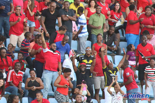 Photo: Soca Warriors supporters cheer on their team during 2017 Gold Cup playoff action against Haiti at the Ato Boldon Stadium in Couva. (Courtesy Chevaughn Christopher/Wired868)