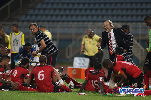 Photo: Trinidad and Tobago National Senior Team head coach Tom Saintfiet (right) talks to his squad during 2017 Gold Cup playoff action against Suriname at the Ato Boldon Stadium, Couva on 4 January 2017. (Courtesy Chevaughn Christopher/Wired868)