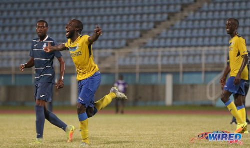 Photo: Defence Force striker Jamille Boatswain (centre) celebrates the second goal of his treble against Police FC during the Pro Bowl semifinals at the Ato Boldon Stadium on 12 February 2017. Looking on (right) is his teammate and captain Jerwyn Balthazar. Defence Force won 4-0. (Courtesy Sean Morrison/Wired868)