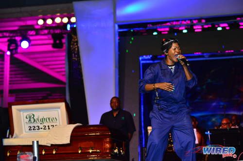 Photo: Lornette "Fya Empress" Nedd-Reid performs her calypso "Guilty" at the Calypso Monarch finals on 26 February 2017 at the Queen's Park Savannah. Her very visible casket didn't help her to bury the competition, which included the now nine-time king. (Courtesy Wired868)