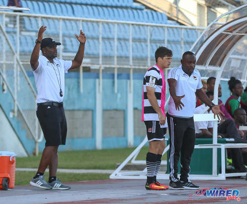 Photo: Central FC head coach Dale Saunders (right) gives instructions to substitute Sean De Silva (centre) while assistant coach Stern John gestures during Pro League action against San Juan Jabloteh at the Ato Boldon Stadium in Couva on 5 February 2017. (Courtesy Sean Morrison/Wired868)