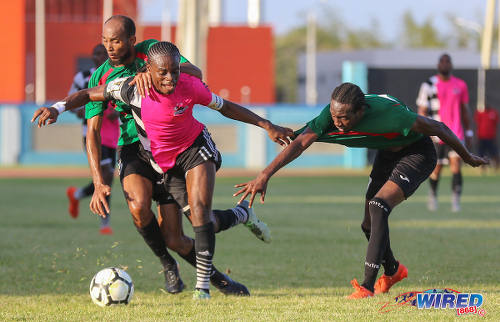 Photo: Central FC captain Darren Mitchell (centre) tussles with San Juan Jabloteh players Nathan Lewis (right) and Akeem Benjamin during Pro League action at the Ato Boldon Stadium in Couva on 5 February 2017. (Courtesy Sean Morrison/Wired868)