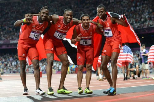 Photo: Trinidad and Tobago 4x400 metre relay team (from left) Jarrin Solomon, Lalonde Gordon, Ade Alleyne-Forte and Deon Lendore celebrate their third place finish at the London 2012 Olympic Games on 10 August 2012. (Copyright AFP 2017/Eric Feferberg)