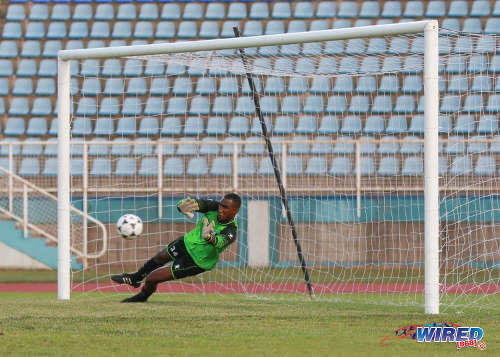 Photo: Club Sando custodian Kelvin Henry dives to his left to keep out a penalty from Central FC attacker Jason Marcano during the Pro Bowl semifinals at the Ato Boldon Stadium on 12 February 2017. Central won 5-4 on kicks from the penalty mark. (Courtesy Sean Morrison/Wired868)