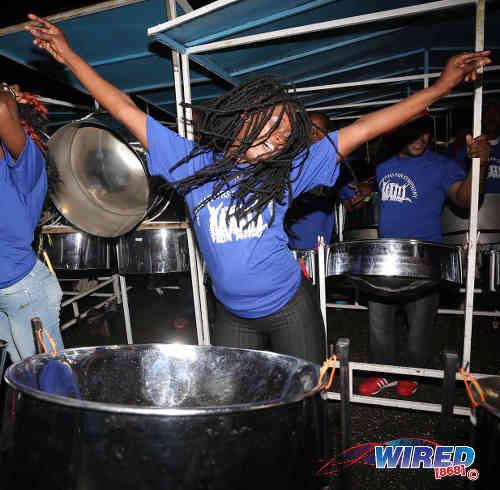 Photo: Simple Song Steel Orchestra pannist, Makeda, dances during their rendition of "Rebecca." (Courtesy Annalicia Caruth/Wired868)