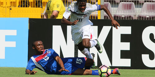 Photo: Trinidad and Tobago National Under-20 Team captain Jabari Mitchell (right) skips a challenge during 2017 World Cup qualifying action against Bermuda at the Estadio Ricardo Saprissa on 19 February 2017. (Copyright Carlos Borbon/Straffon Images)